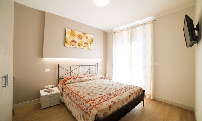 Cupra Marittima Apartment | Finely furnished apartment a stone's throw from the sea with swimming pool, gym, WiFi