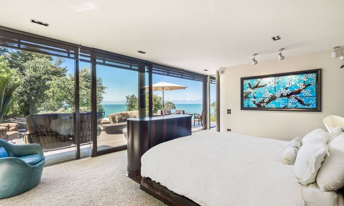 Ngaio Bay Cabin | Fireplace Suite - Ocean Views, Beach Access & Full-Service Luxury Lodge