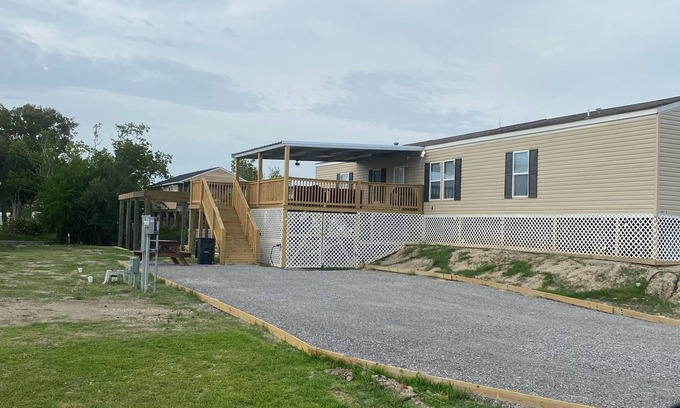 Hackberry House | Fishing camp with water access and boat house