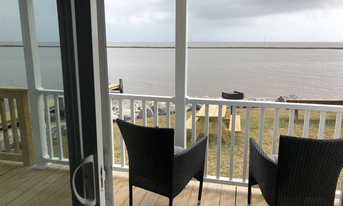 Eastpoint Cottage | (Fishing from dock) Boat launch, seafood market & bait-tackle shop next door.