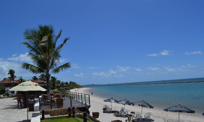 Porto de Galinhas Apartment | Flat Ground Floor Special with balcony in Marupiara Suites Flat 120 - 12x semjuros
