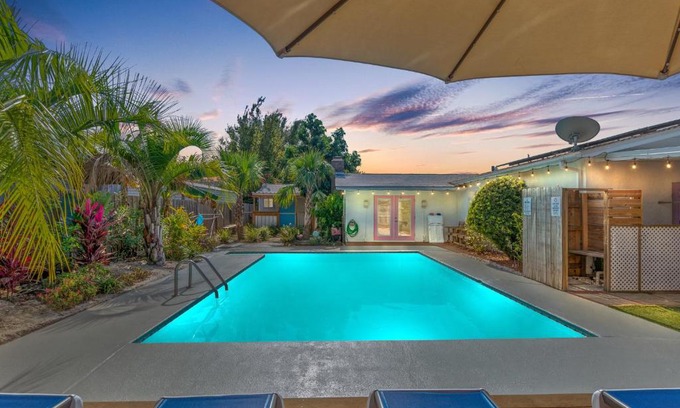 Upper Grand Lagoon House | Flirty Flamingo with Private Heated Pool, Game Room, and AMAZING Covered Outdoor Living