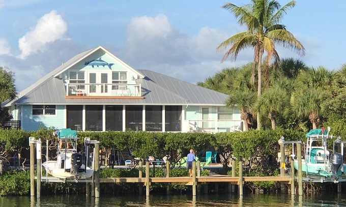 Palm Island House | Florida Island paradise! Pool, Dock, poolside bar and TV. Close to beach.