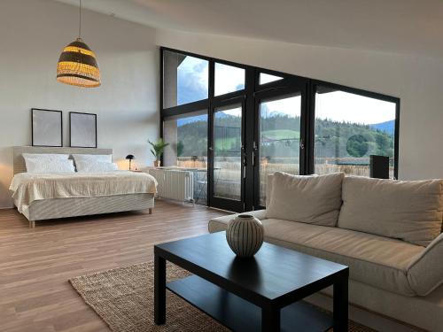 Mitterbach Apartment | Flow Living I 118qm Design Maisonette mit Watzmannblick I Pool