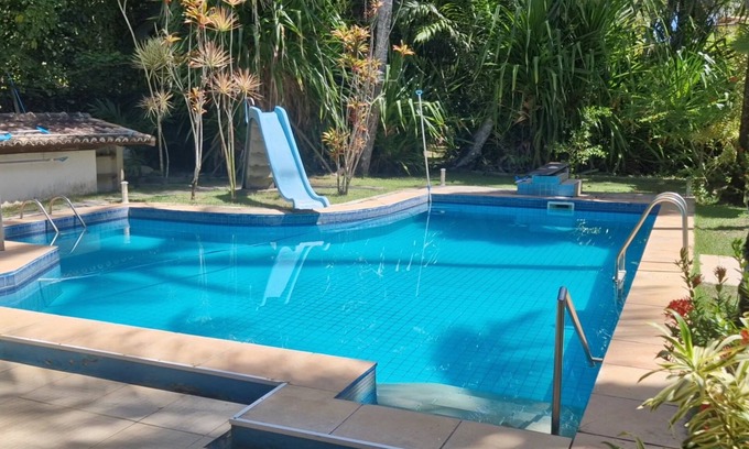 Guaiu House | Flower house on the edge of Guaiú beach in a high-standard condominium.