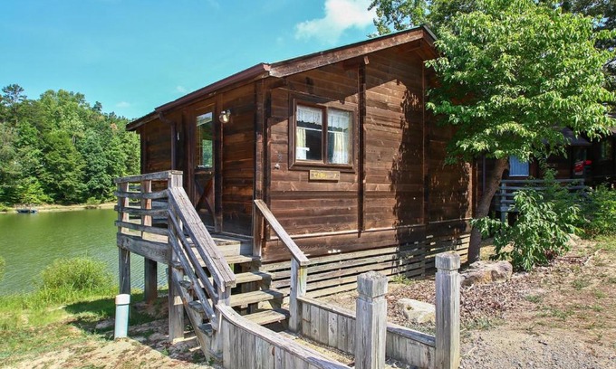 Advance Resort | Forest Lake Camping Resort Lakefront Cabin 1