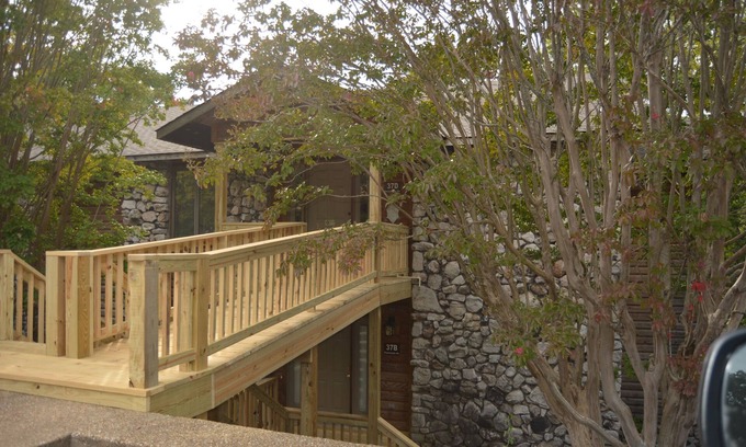 Mount Ida Condo | Forest view, log-sided two bedroom, two bath condo on Lake Ouachita. by RedAwning