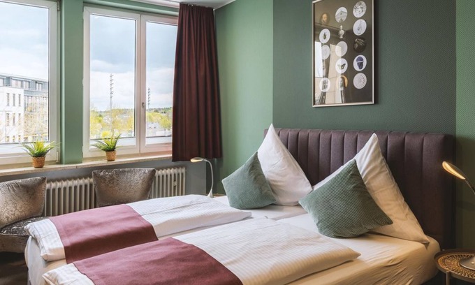 Bitburg House | Four-bed room LouM - Hotel Louis Müller
