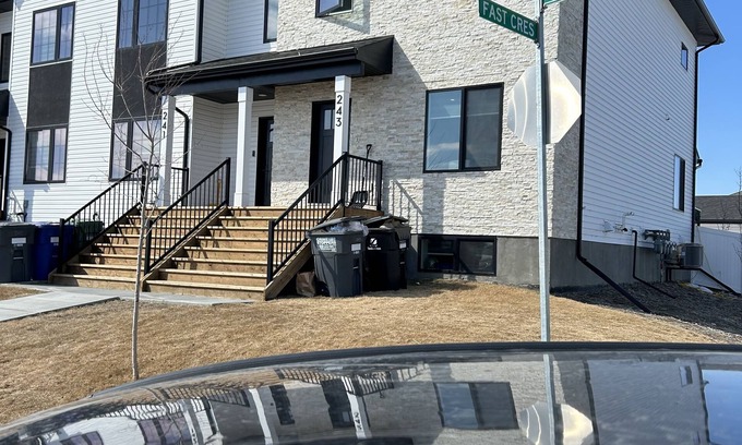 Saskatoon House | Four bedroom four bathroom townhouse with free parking for 4 vehicles.