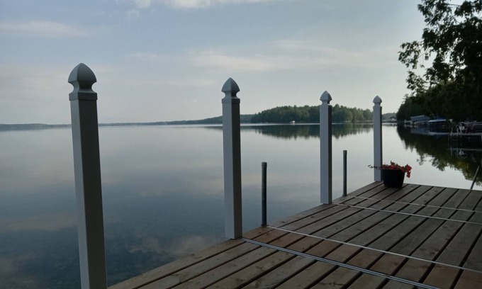 Burnt River Cottage | Four Mile Lake 5 Bedroom cottage,100 feet of private shoreline, 4 decks, TV room