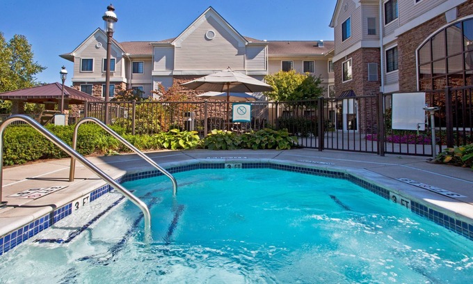 Utica Condo | Free Breakfast Buffet. Pool & Hot Tub Access. Great Location!