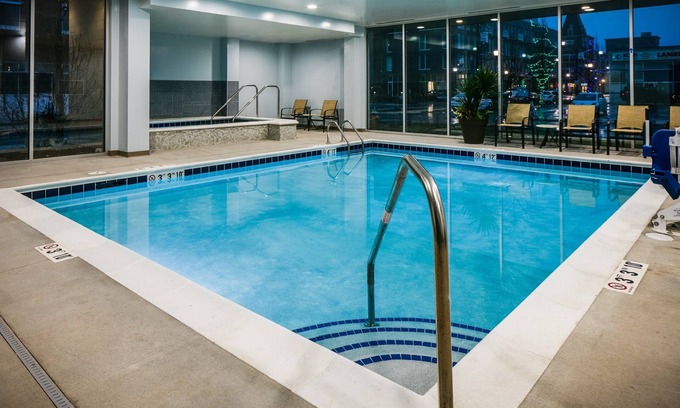 Historic East Village Condo | Free Breakfast, Free Wi-Fi, Business Center | Indoor Pool + Hot Tub