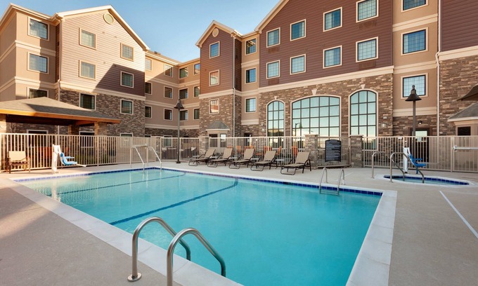 Midland Condo | Free Breakfast. Pool. King Suite. Near the new Chevron and Oxy campuses!