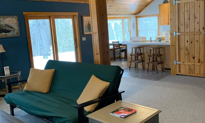 Carp Lake House | Full Home Rental on Paradise Lake. 2 Acres/60 ft of Lakefront & Private Dock