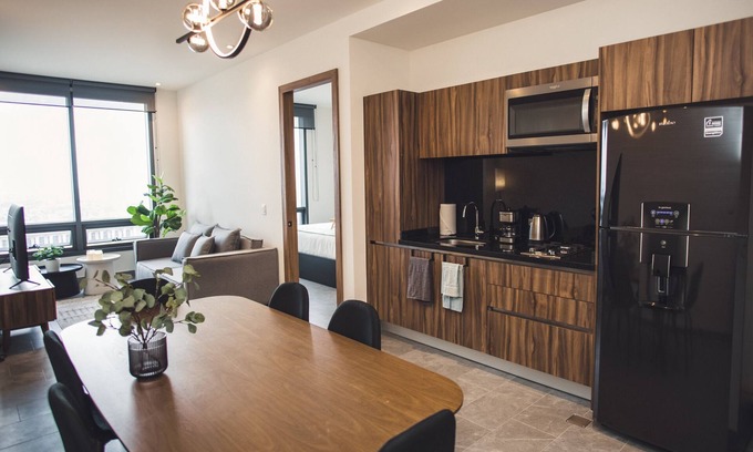 Cuauhtemoc Apartment | Fully equipped kitchen, high speed internet, comfy king-size bed and a small sofa bed.