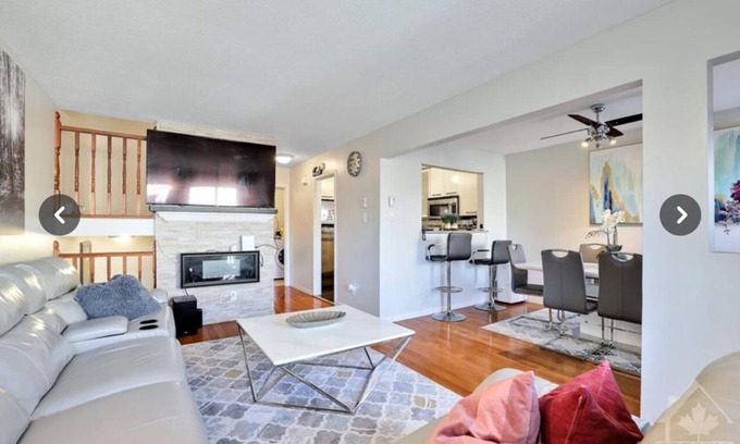 Ottawa Division Condo | Fully furnished bedroom in a cozy, modular home.