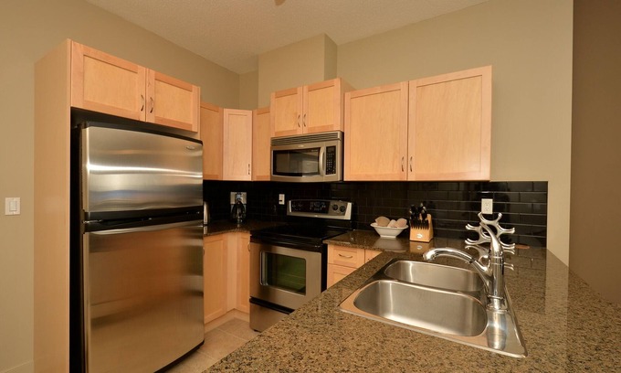 Lake Bonavista Condo | Fully Furnished Executive Suite Close to Transit and Amenities