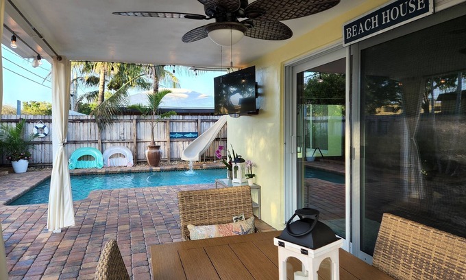 Garden Isles House | FULLY REMODELED HOME WITH PRIVATE HEATED/CHILLED POOL, WATER SLIDE, POOL TABLE