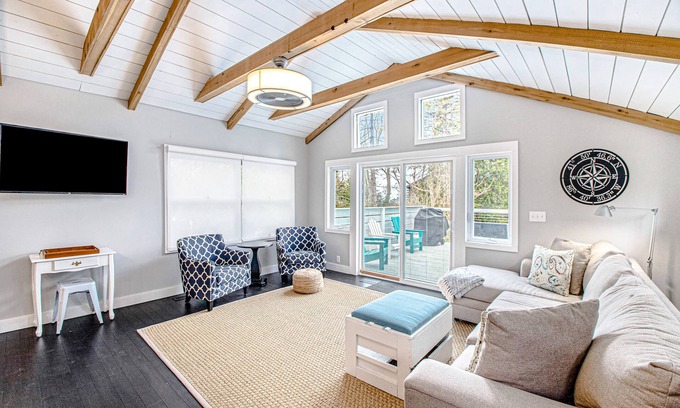 Lakeside House | Fully-renovated lakefront home with beach cabana, association beach, & firepit