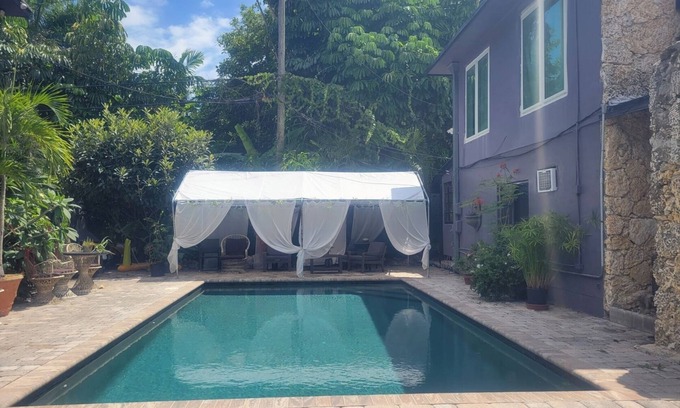 Southwest Coconut Grove Cottage | Furnished pool cottage in Coconut Grove! Biscayne Bay access at end of street!