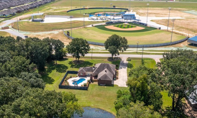 Youngsville House | Gameday Getaway Pool Pond King Bed Sports Complex