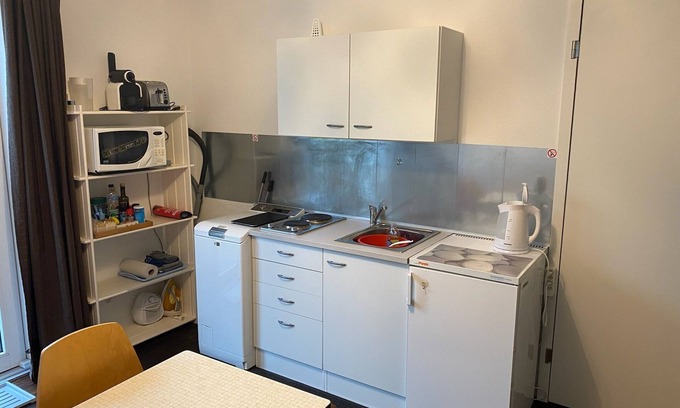 Brunnadern Apartment | Garden studio with free parking in quiet residential area.