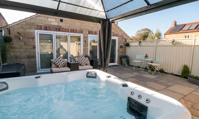 Malton Cottage | GARTHGATE HOLIDAY LODGE, pet friendly, with hot tub in Malton