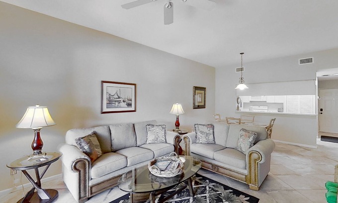 Bonita Bay Condo | Gated resort community condo with water views, pool, hot tub, & balcony