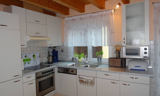 Oberschwarzach Apartment | Gemütliche Ferienwohnung mit voll ausgestatteter Küche, viele Führungs- und Freiezeitangebote