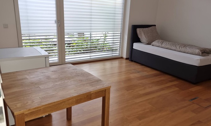 Helpfau-Uttendorf Apartment | Geräu. Ground floor apartment with terrace in the village center with 8 bedrooms. 2 bathrooms and a kitchen