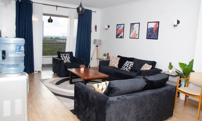 Nairobi West Apartment | Get a magnificent aerial view of the expansive Nairobi game Park from a balcony