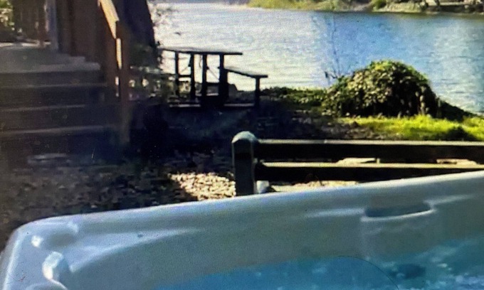 Brookings House | Get away on the river with fire pit and Hot Tub