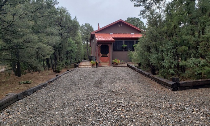 Tijeras House | Get away to the cool mountains and relax at the Cuddle Cottage! Double occupancy