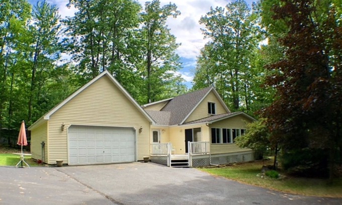 Higgins Lake House | Get away to this beautiful open concept house within walking distance to Higgins