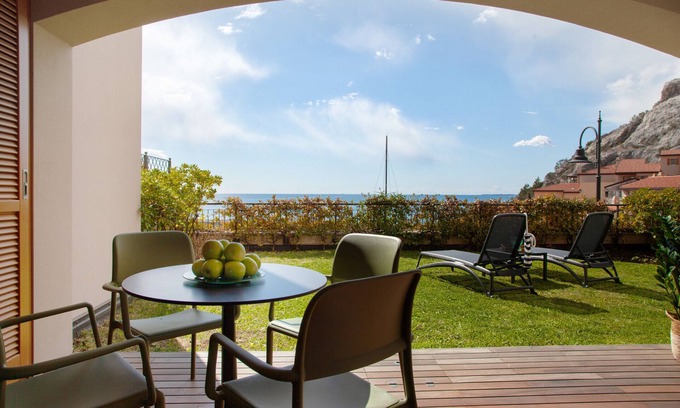 Portopiccolo Apartment | Giardino Fiorito - Portopiccolo Apartments