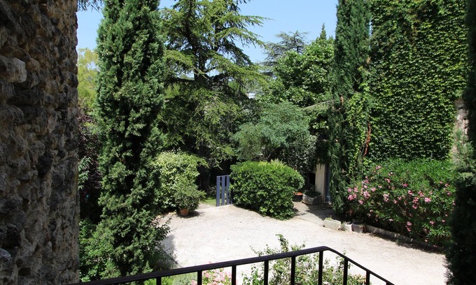Cabrieres-d'Avignon Apartment | Gite Lou Bancaou classified 2 * in stone property in the village center