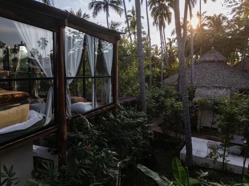 Saladita Apartment | Glass Treehouse, Sauna, Ice Bath, Yoga in Saladita, 50m from Surf