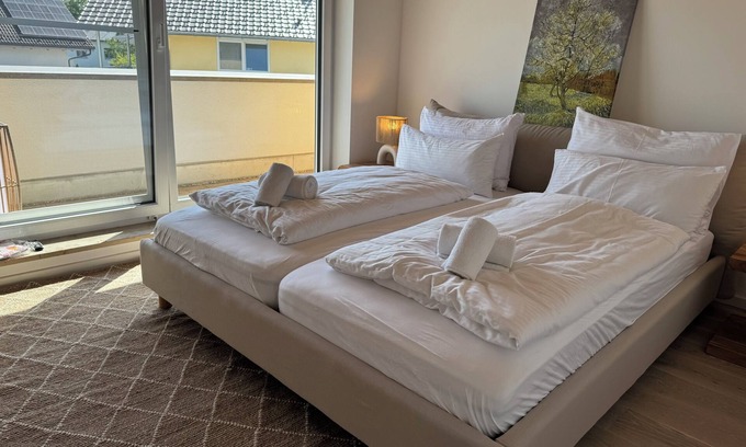 Worthsee Apartment | ღLIBORIA Idyllic roof terrace apartment with a view of Lake Wörth