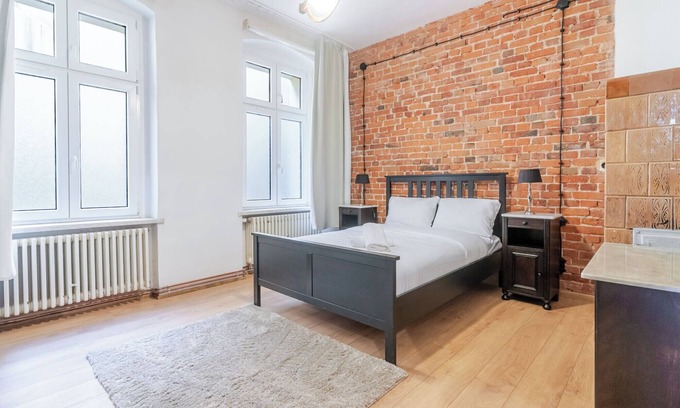 Gliwice Apartment | Gliwice Industrial Brick Style Apartment