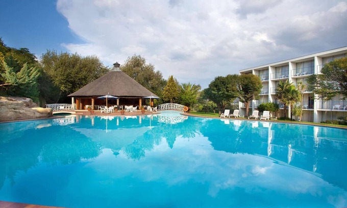 Maseru House | Go on Safari in South Africa! Shuttle Service, Free Parking and Outdoor Pool!