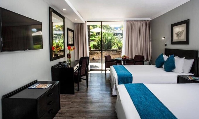 Maseru Apartment | Go on Safari in South Africa! Shuttle Service, Free Parking and Outdoor Pool!