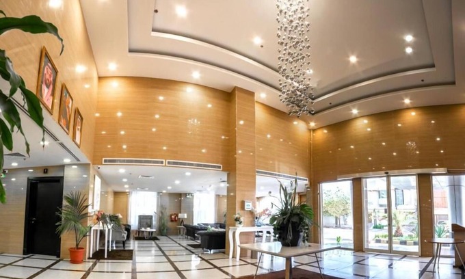 Al Hamra Hotel | Golden Garden Al Corniche Hotel