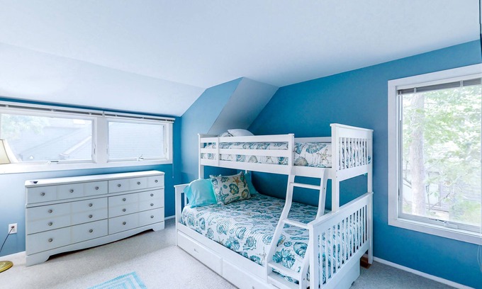 Mews Village House | Golf-course-front townhome with leafy patio & prime location near the beach