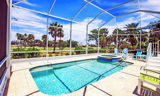 Beachview Country Club Estates House | Golf course pool home on 12th hole of the Sanibel Island Golf Club - Isle Awhile