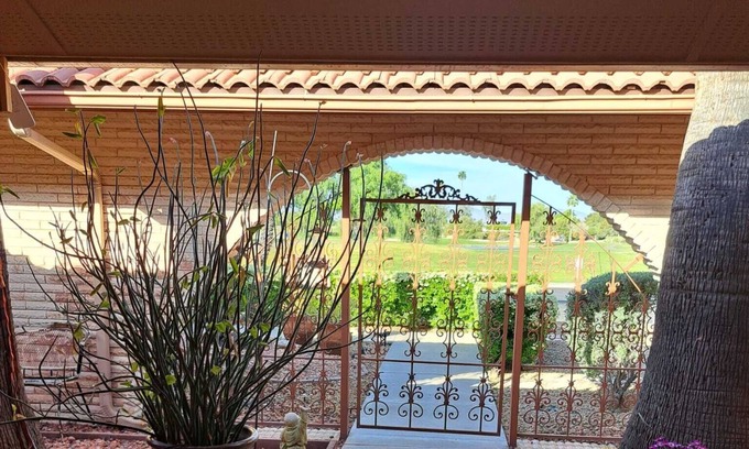Sun City West House | Golf course view home with a private backyard oasis