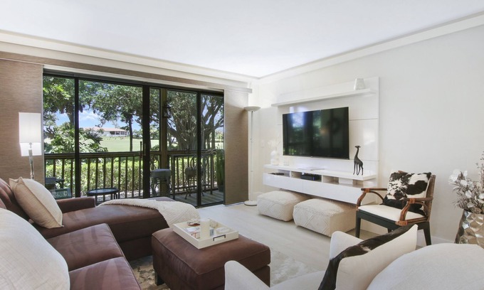 Hunt Club Condo | Golf Views - Pool - Walk to PGA Resort - Dog Friendly!