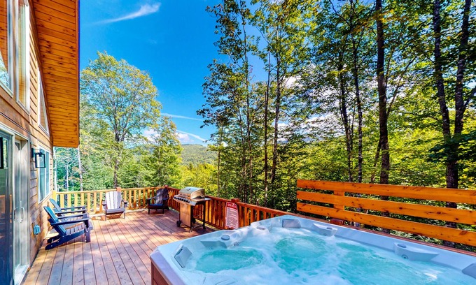 Carrabassett Valley Cabin | Gorgeous dog-friendly cabin with great view, deck, hot tub, & gas fireplace