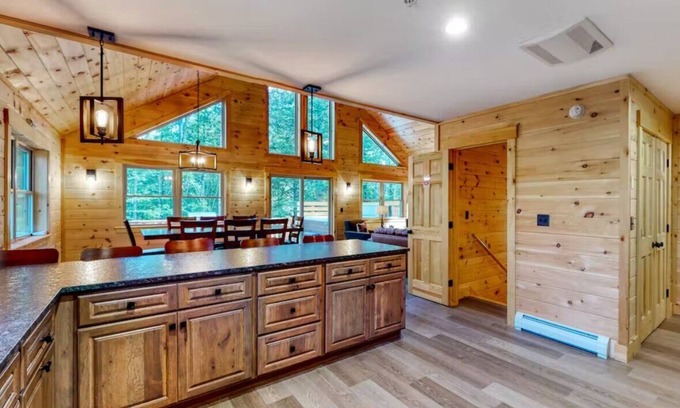 Carrabassett Valley Cabin | Gorgeous dog-friendly cabin with great view, deck, hot tub, & gas fireplace