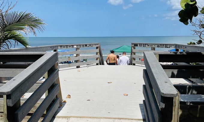 South Patrick Shores Condo | Gorgeous Ocean and Launch Views from top floor. Condo Completely Remodeled.