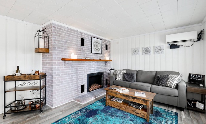 Heron Walk House | Gorgeous riverside guest house with firepit, patio - great location